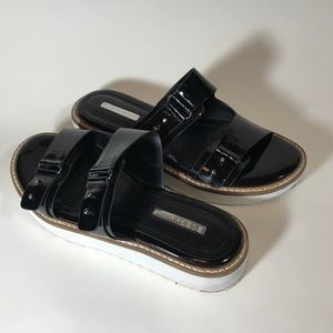 BCBGeneration black patent leather wedge sandals